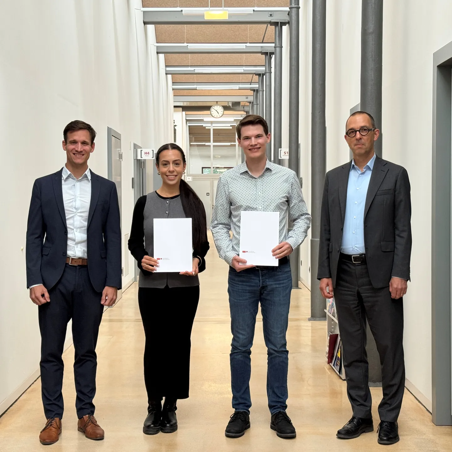 Preisträger zusammen mit einem Vertreter der Universität und der Palmary-Stiftung